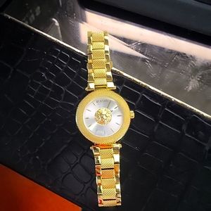 Men versus Versace watch gold